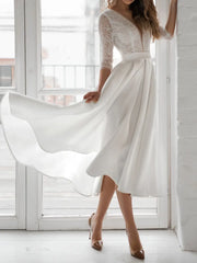 Chic White Backless Deep V-Neck Midi Dress