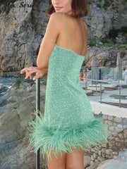 Chic Backless Mini Dress with Sequin and Feather Details